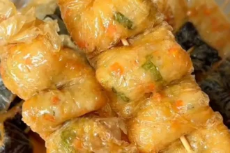 Resep Odeng Chicken Nori, Camilan Gurih Isi Ayam yang Kenyal dan Bikin Nagih 11 odeng chicken nori - ilustrasi berita Resep Odeng Chicken Nori, Camilan Gurih Isi Ayam yang Kenyal dan Bikin Nagih