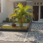 6 Inspirasi Teras Rumah Subsidi dengan Batu Alam dan Palem Kuning, Asri dan Elegan 10 teras rumah subsidi - ilustrasi berita 6 Inspirasi Teras Rumah Subsidi dengan Batu Alam dan Palem Kuning, Asri dan…