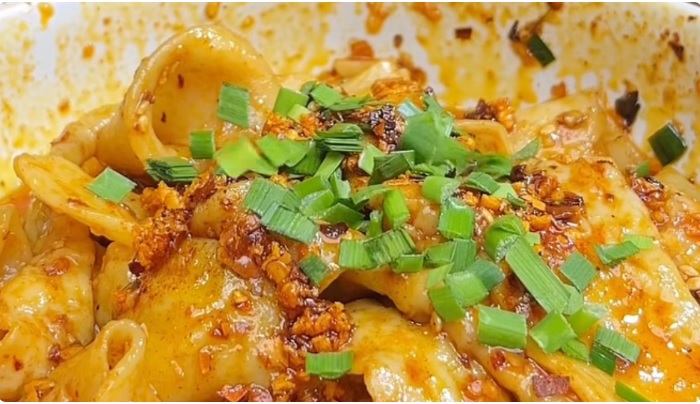 dumpling ayam udang - ilustrasi berita Dumpling Ayam Udang Pedas: Cemilan Hangat yang Tengah Viral di Media Sosial